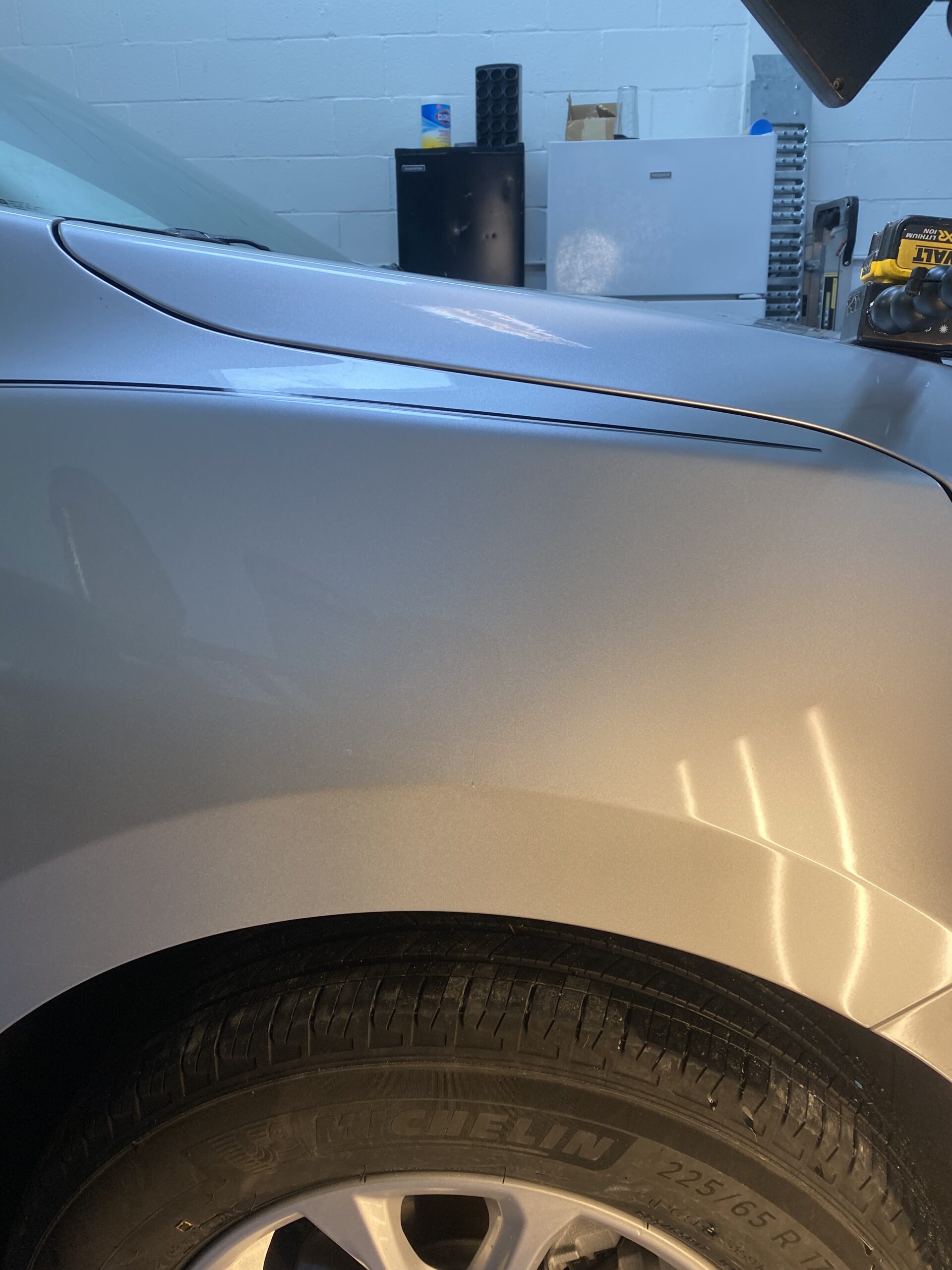 Fender after paintless dent repair