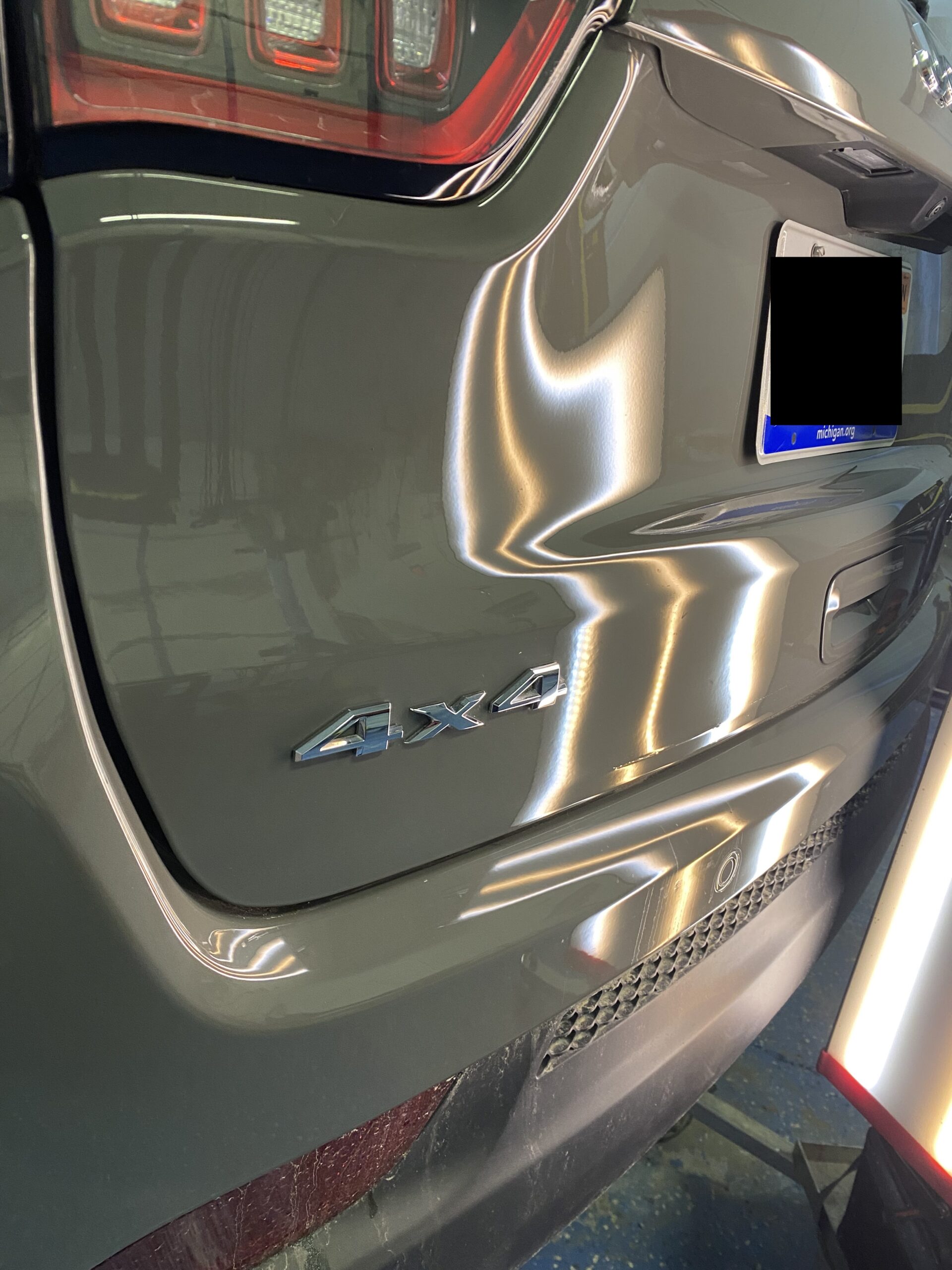 Jeep Compass liftgate dent repair after